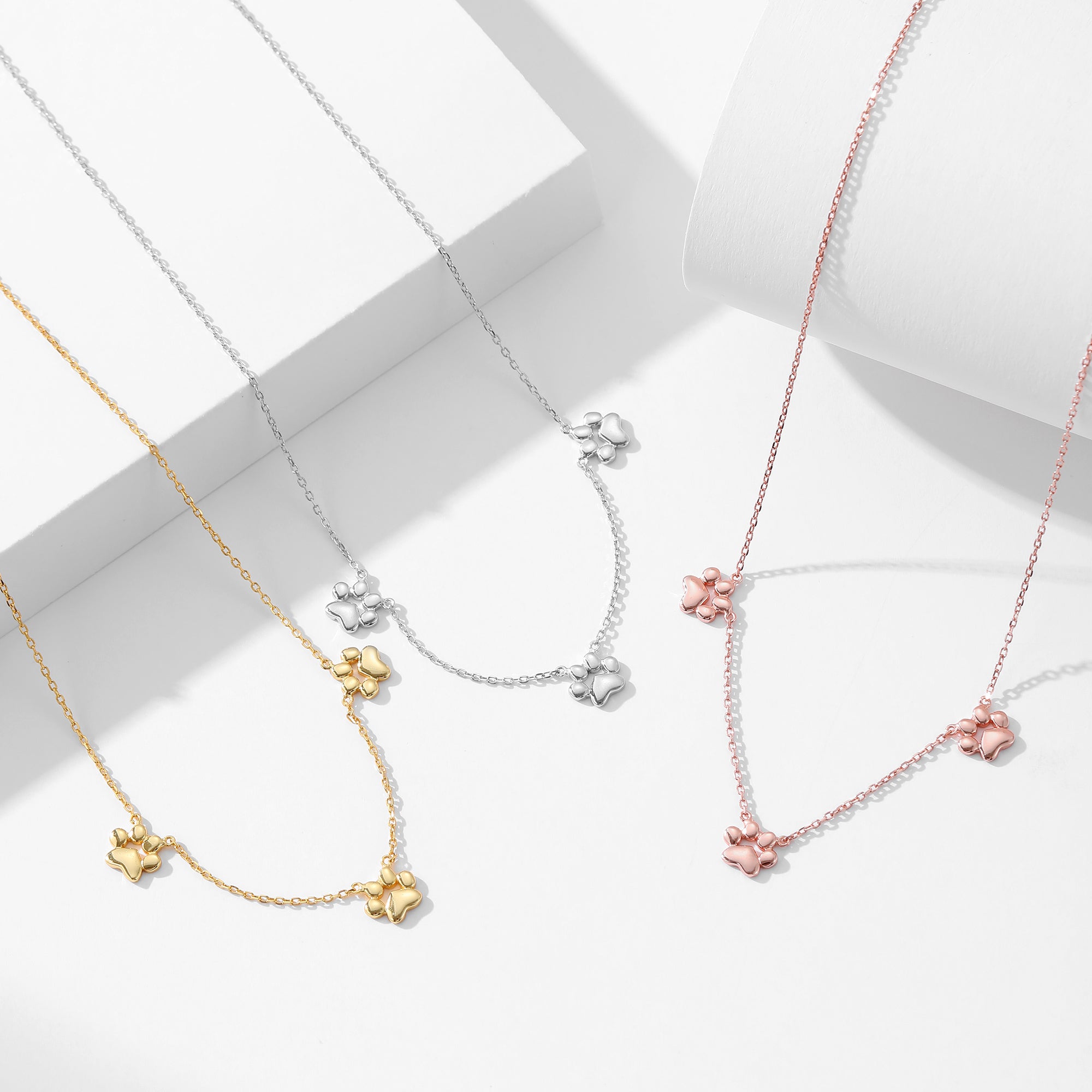 Teeny Tiny Trinity Paw Necklace